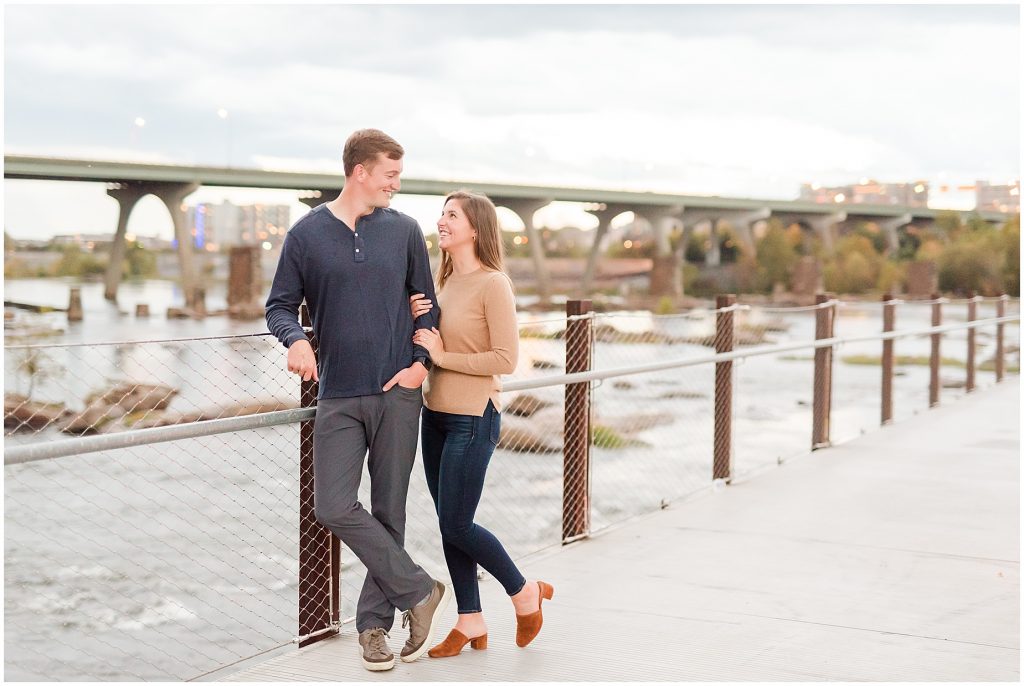 engagement couple on t. pottersfield bridge at the james river in Richmond Virginia