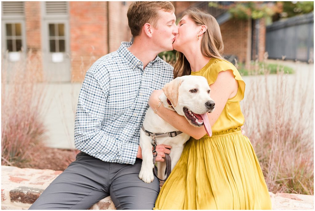 engagement couple with lab puppy at tredegar museum in richmond virginia