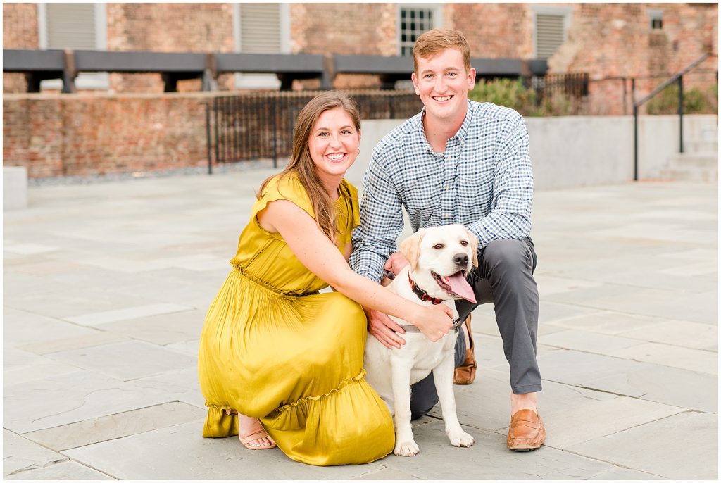 engagement couple with lab dog at tredegar museum in richmond virginia