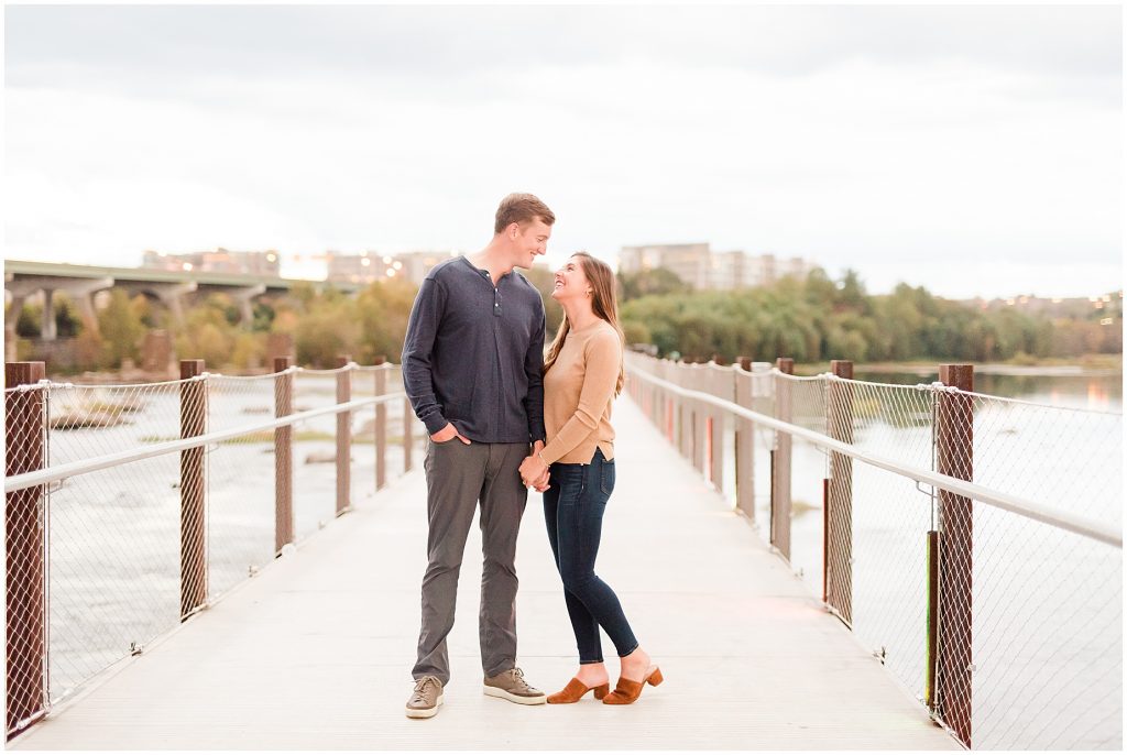 engagement couple at historic t pottersfield bridge at the james river in Richmond Virginia