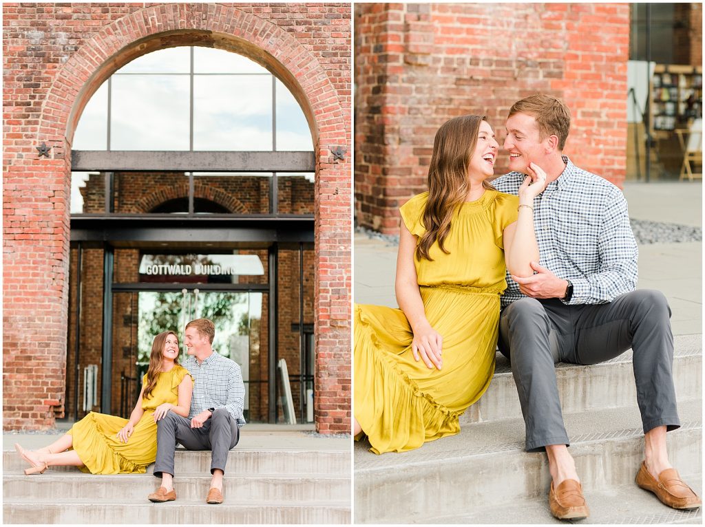 engagement couple sitting at brick arch at historic tredegar museum in richmond virginia