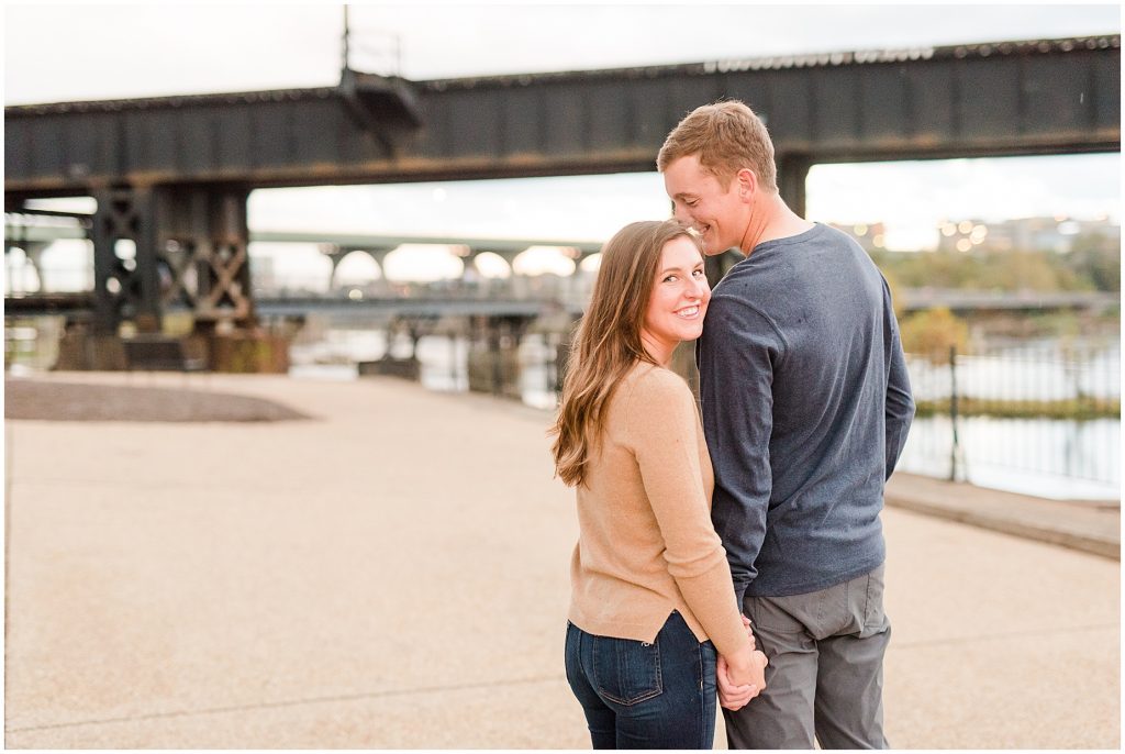 engagement couple at historic t. pottersfield bridge at the james river in Richmond Virginia